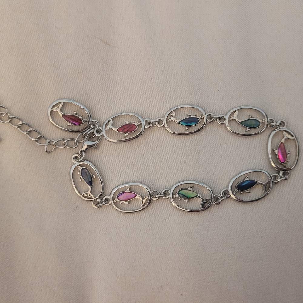 Elegant Silver Bracelet with Multicolor Dolphin Stones